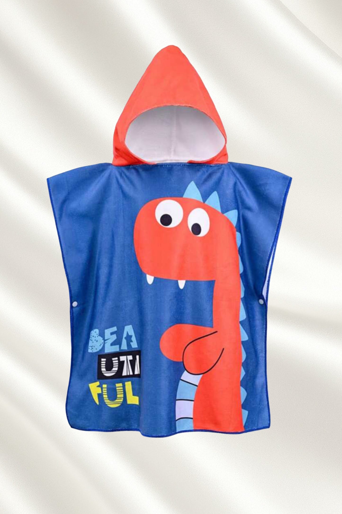 Serviette de bain pancho à motif dinosaure