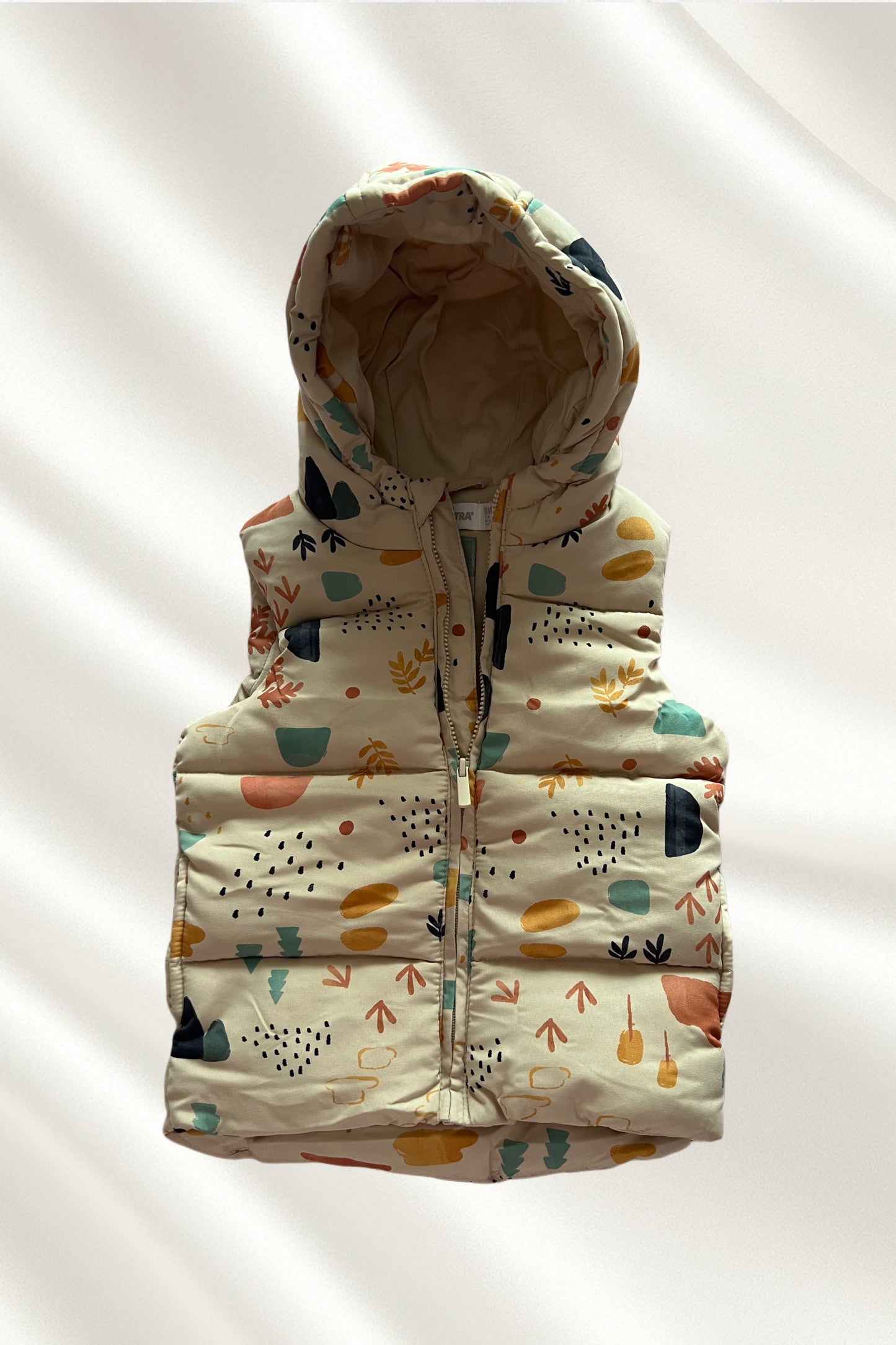 Gilet beige sans manches à capuche