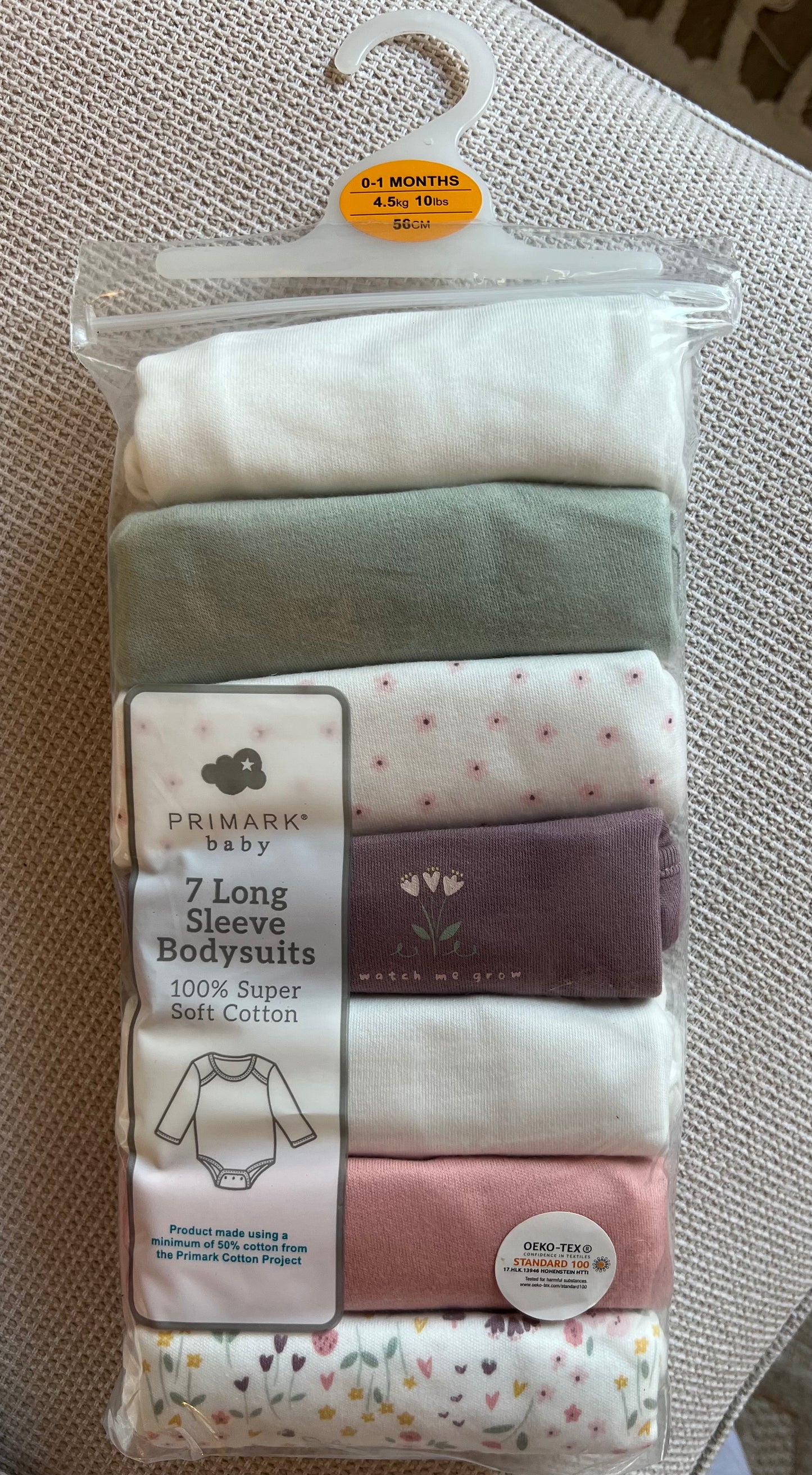 Pack 7 bodies manches longues fleuries pour fille