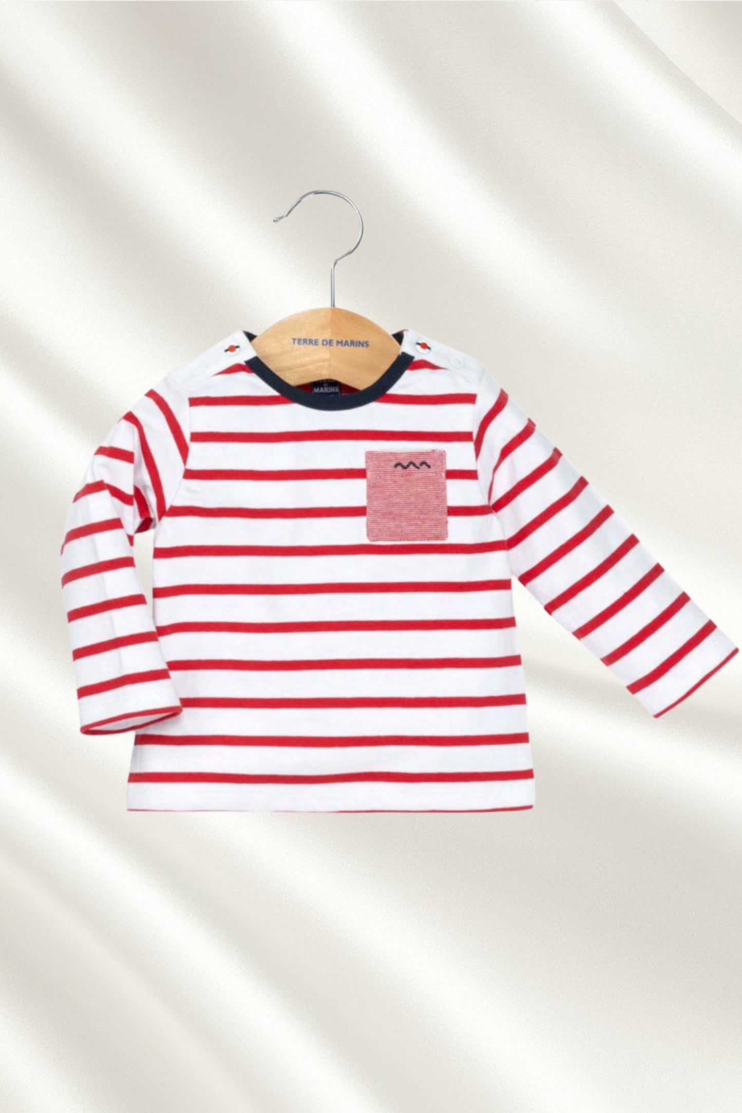 Pull rayé en rouge
