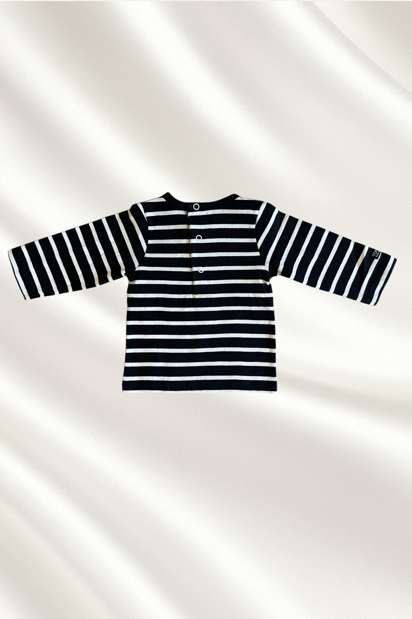 Pull rayé en blanc et bleu marine