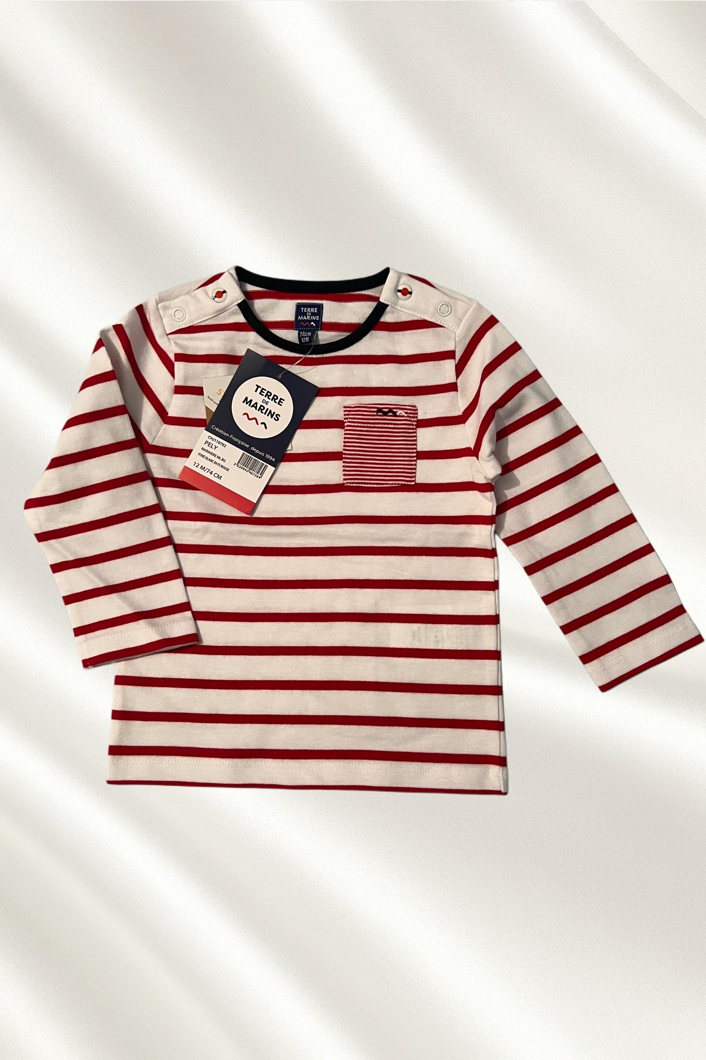 Pull rayé en rouge