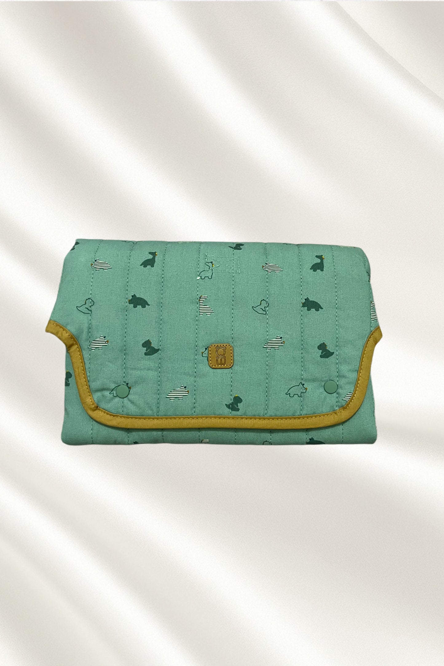 Tapis à langer vert