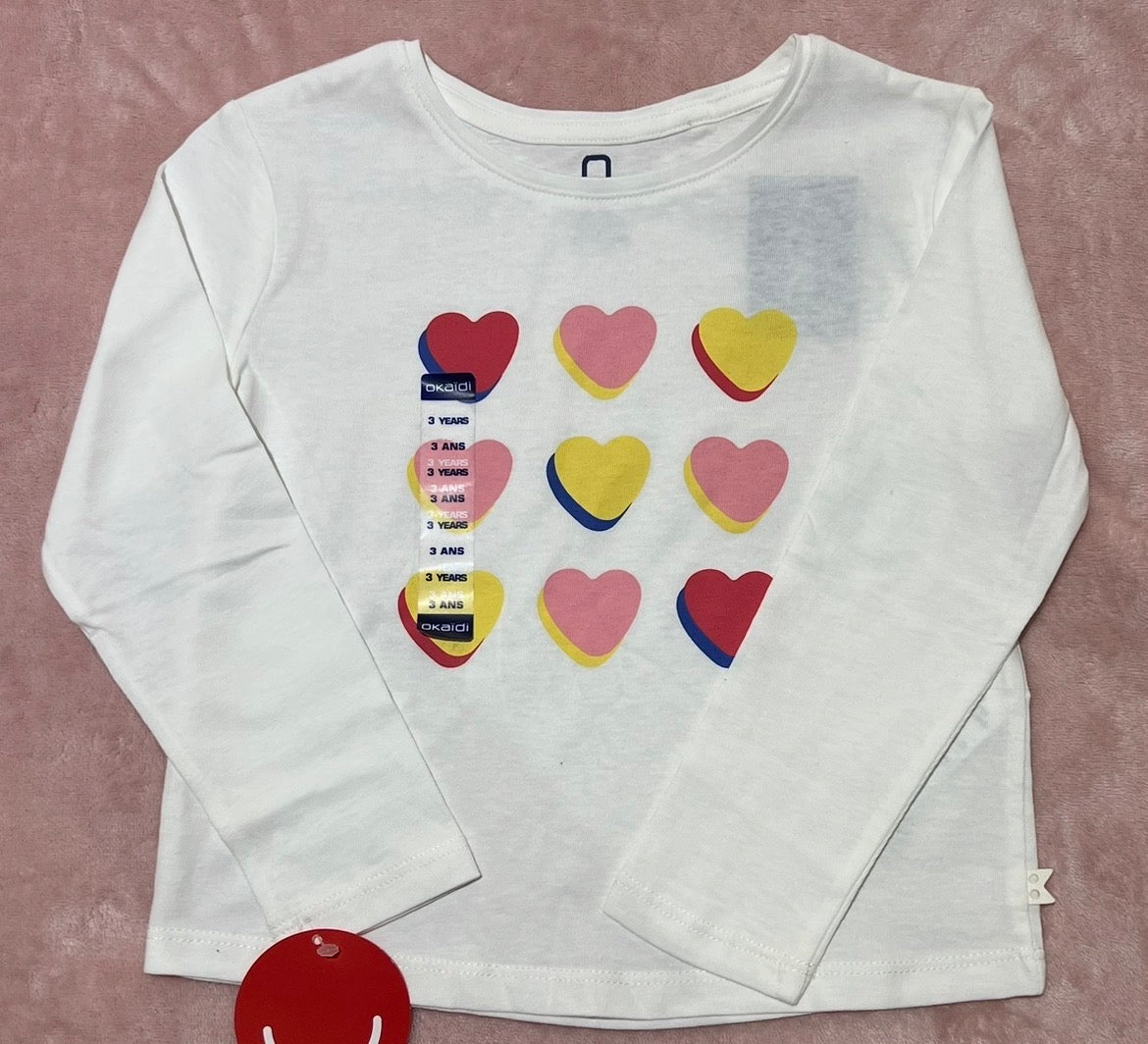 Pull blanc motifs coeurs avec manches