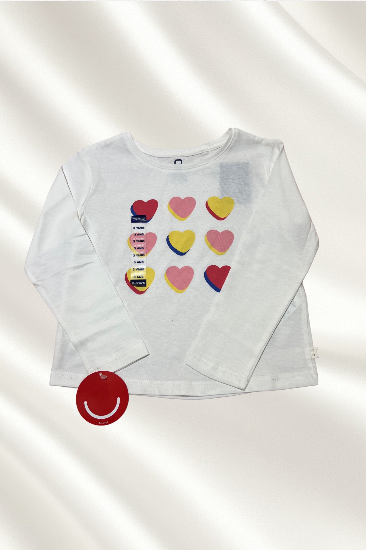 Pull blanc motifs coeurs avec manches