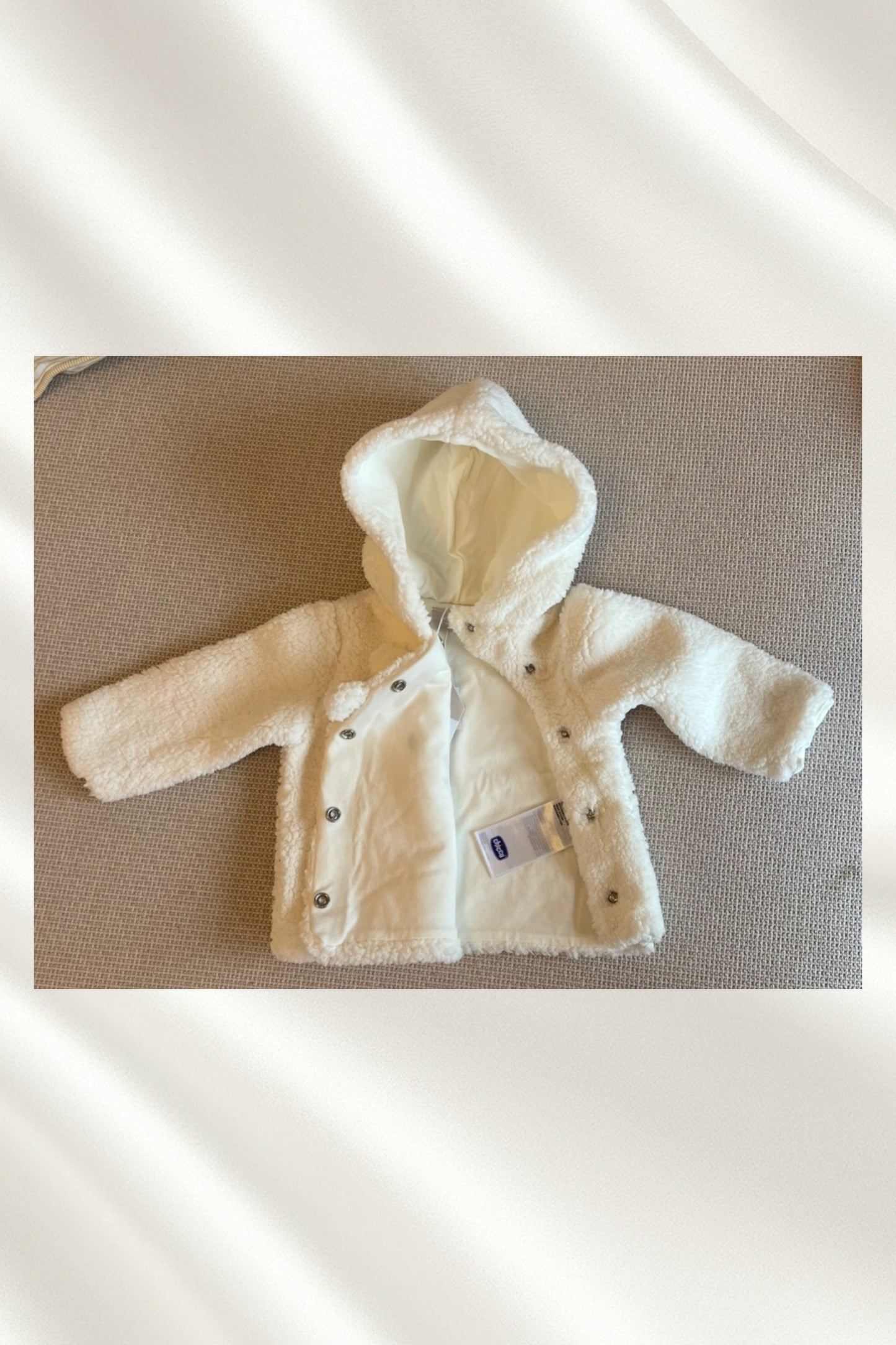 Manteau blanc à capuche pour bébé