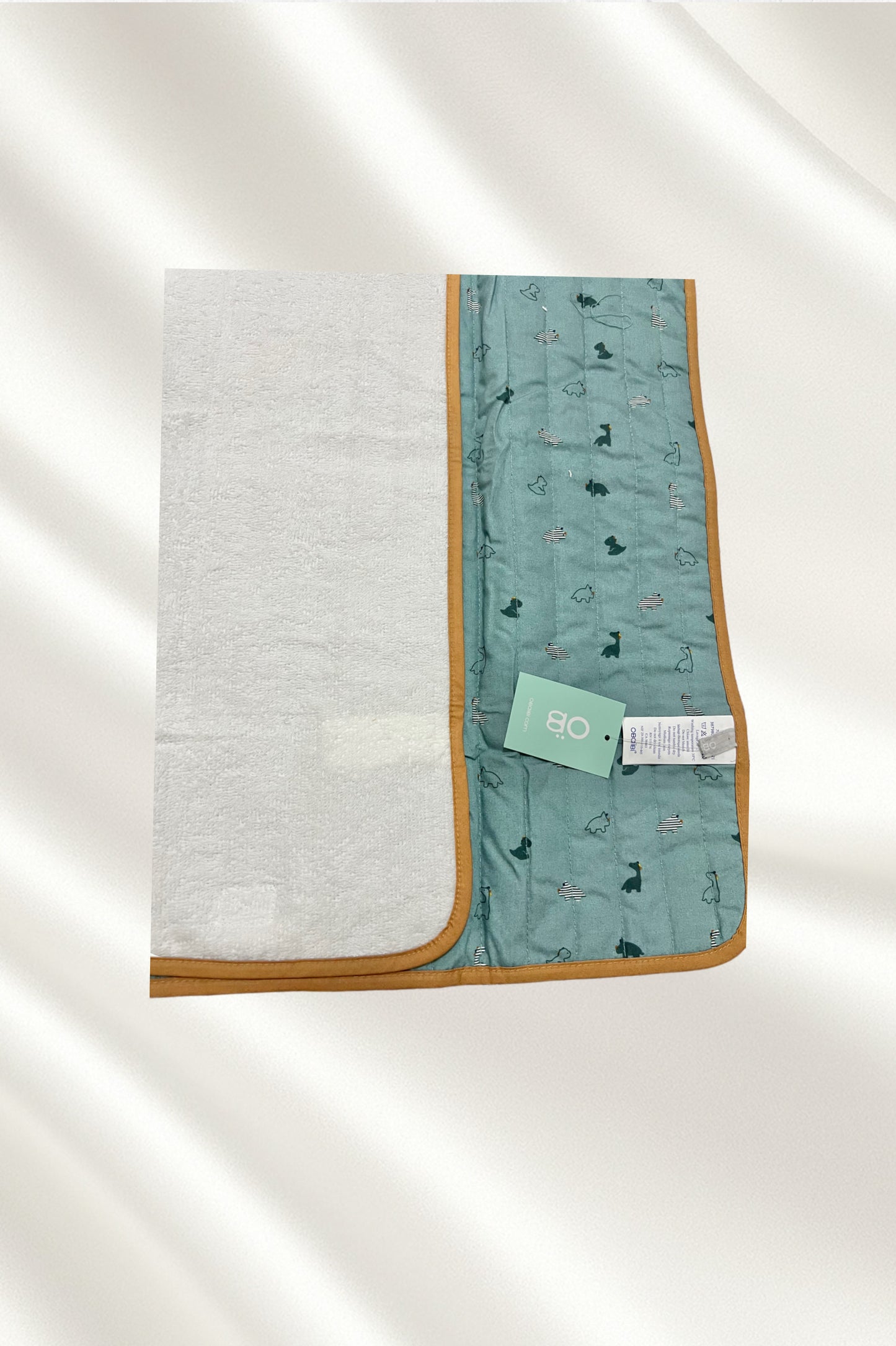 Tapis à langer vert