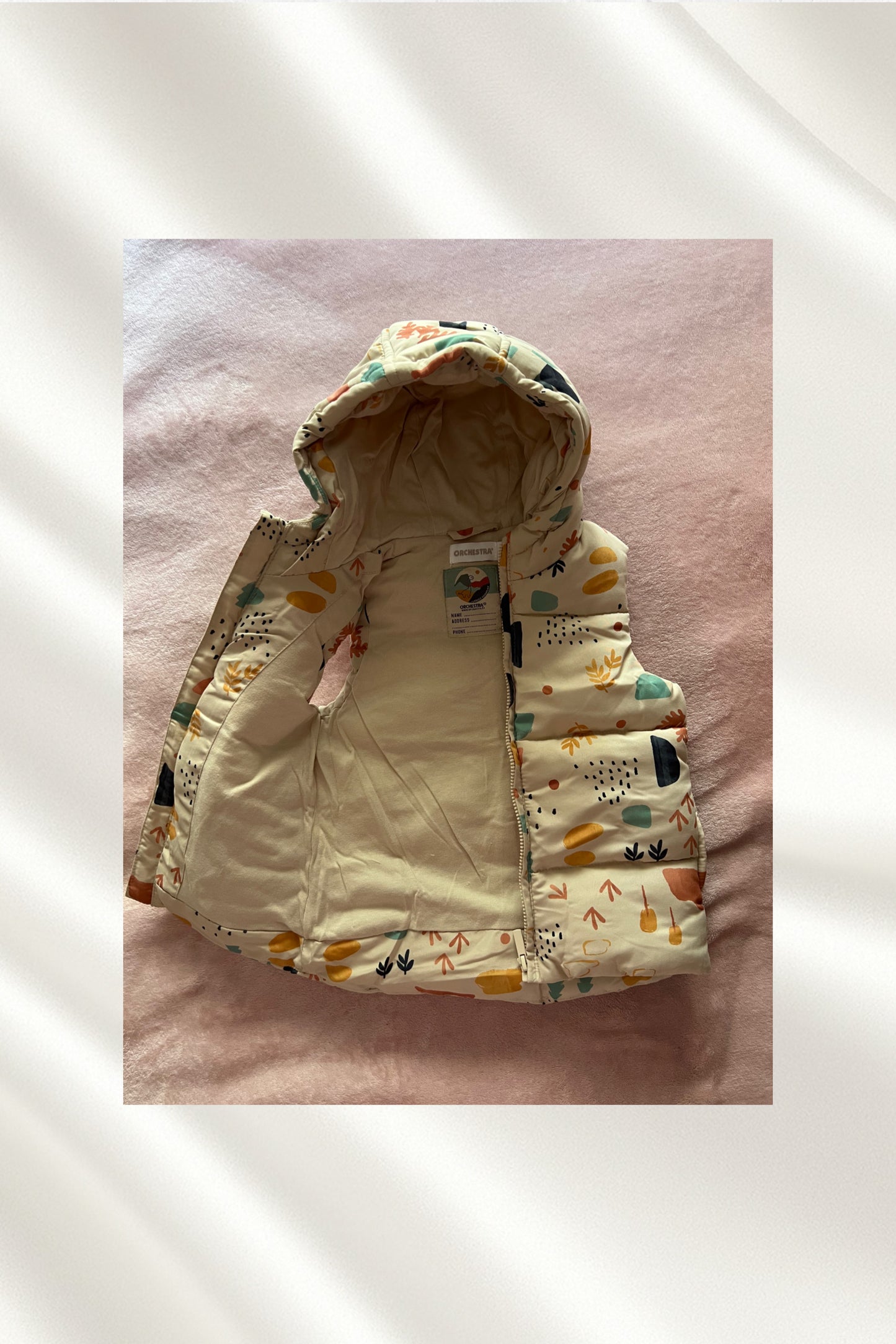 Gilet beige sans manches à capuche
