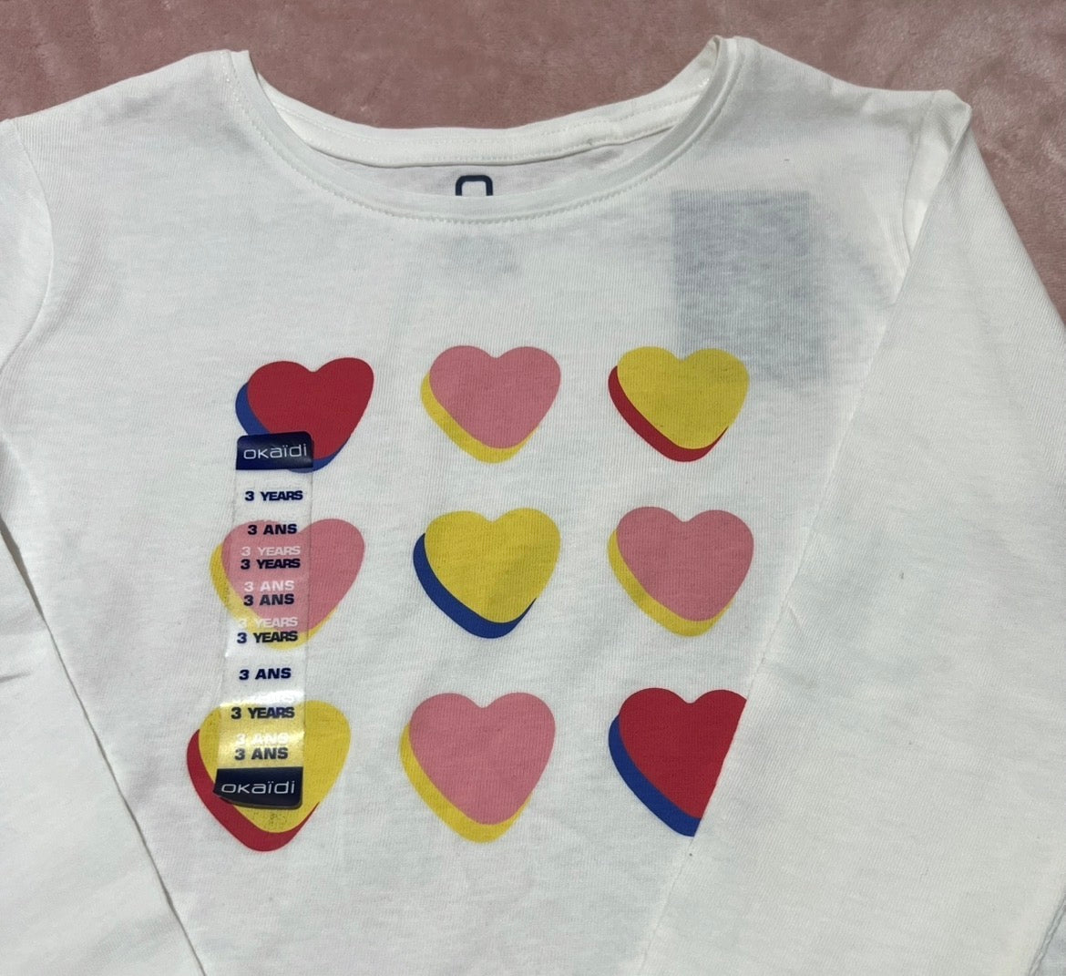 Pull blanc motifs coeurs avec manches