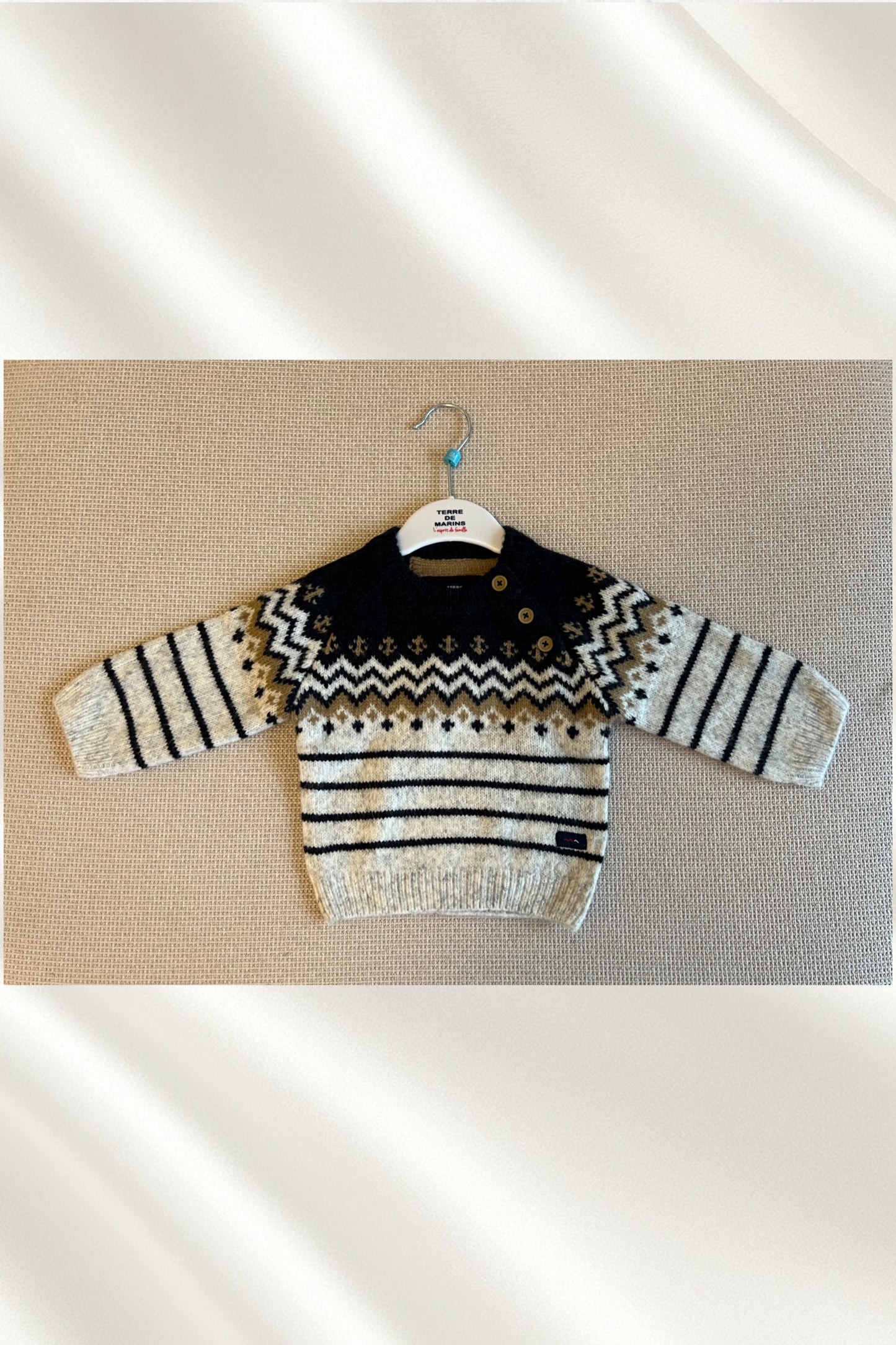 Tricot gris chiné et bleu marine
